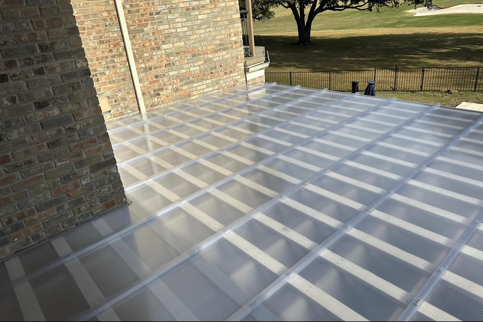 Clear panels over a covered porch